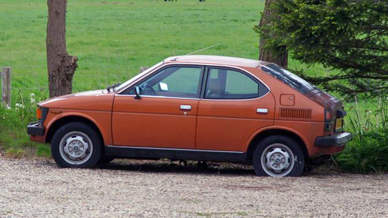 5af9fc26d5290-suzuki_100-gx_4_dr.jpg