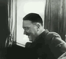 6564a8e5553e1-HitlerGod.gif 